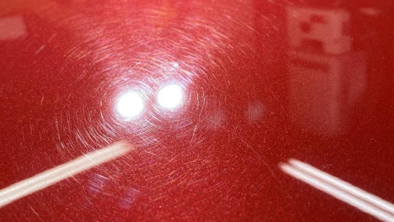 Heavily Scratched Car Paint under LED Lights